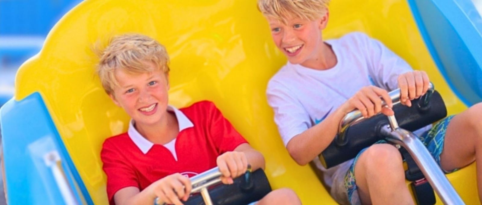 Two children on a ride at Clarence Pier